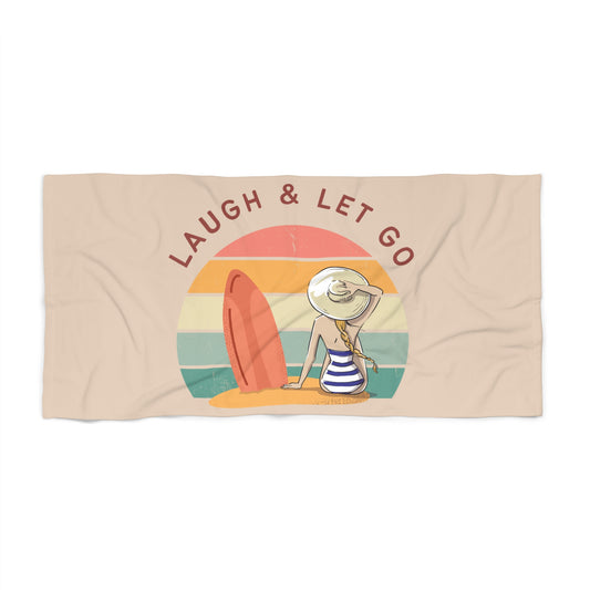 laugh and let go Beach Towel